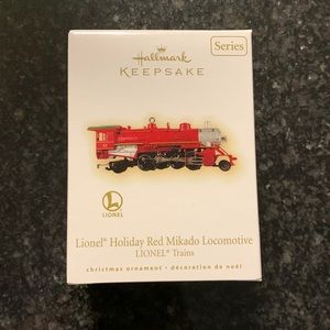 Hallmark Keepsake. Lionel trains. Lionel holiday red Mikado locomotive.